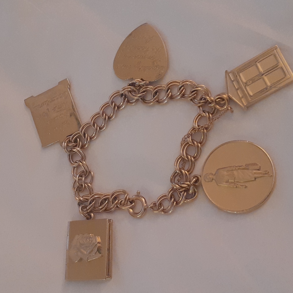Avon charm bracelet President's award 1965